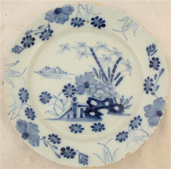 English creamware dish and an English Delft plate, late 18th century,(-)